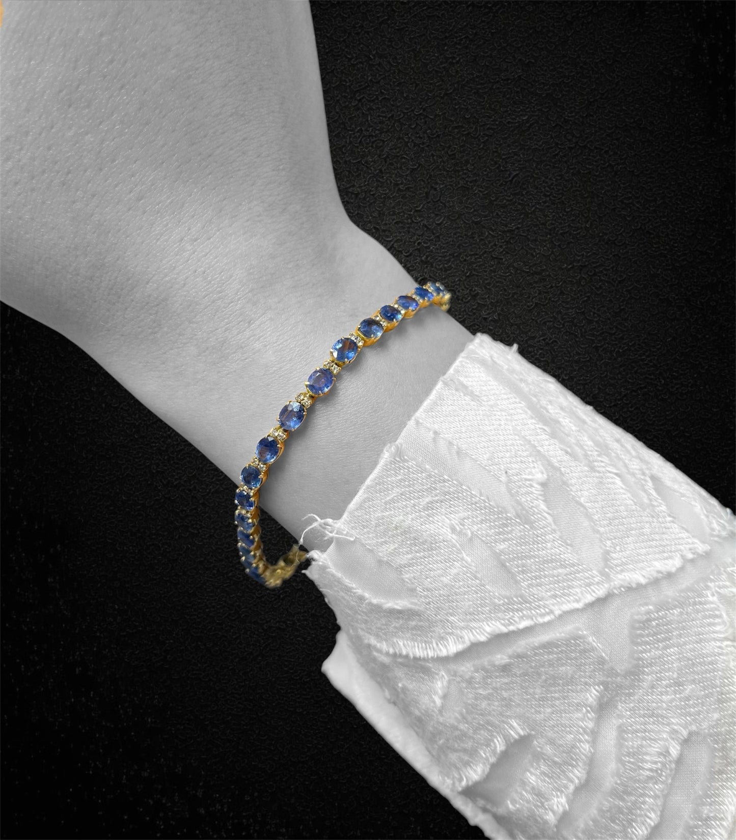 Bracciale tennis con zaffiri e diamanti