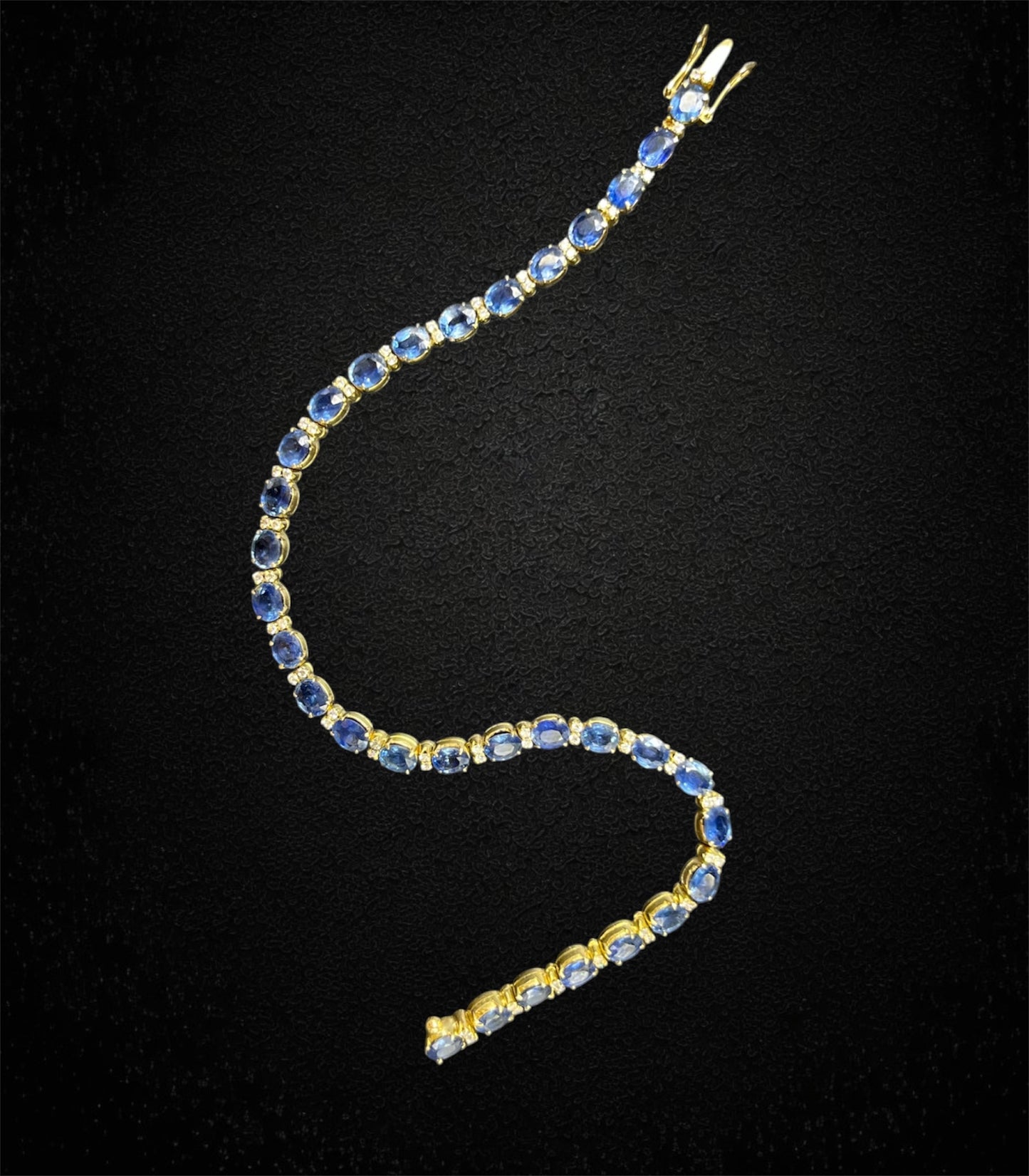 Bracciale tennis con zaffiri e diamanti