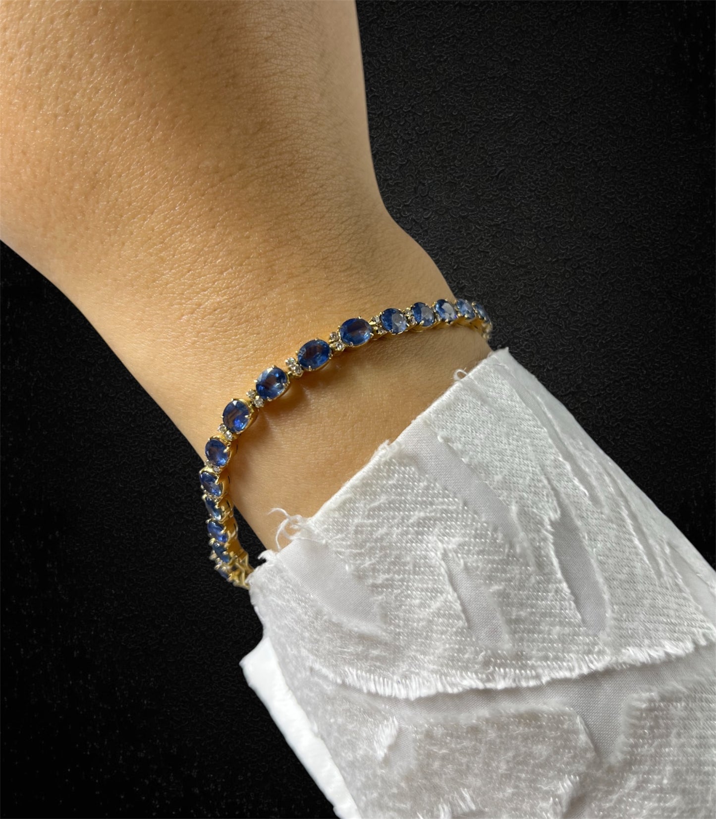 Bracciale tennis con zaffiri e diamanti