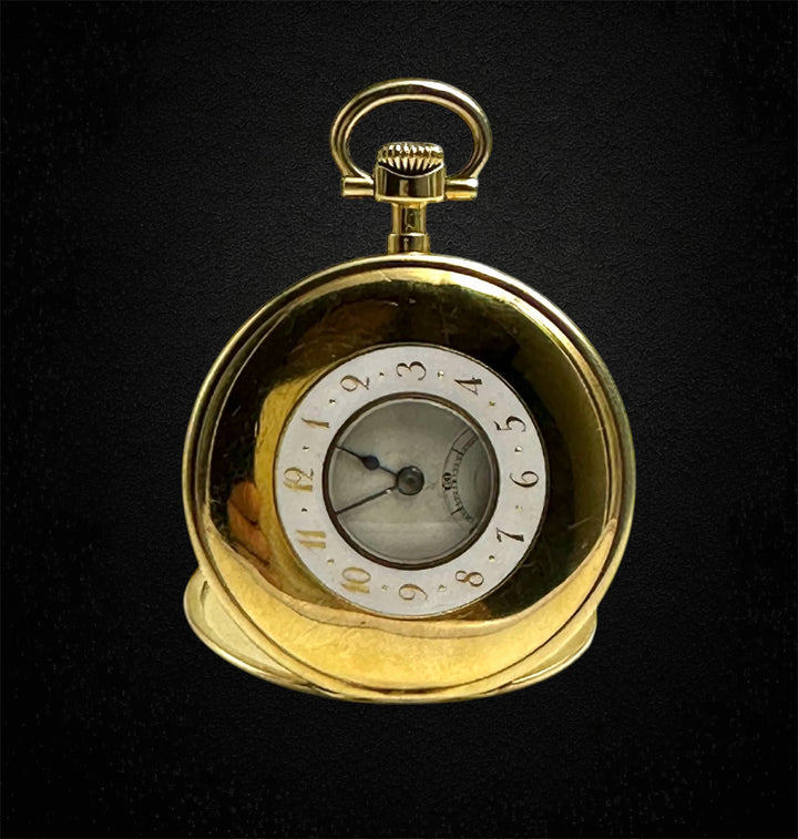 Orologio "occhio di bue" in oro, destinato al mercato inglese.