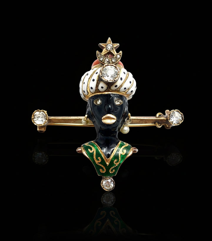 Spilla in oro con smalti policromi con "moretto", firmata Agostino Gigante